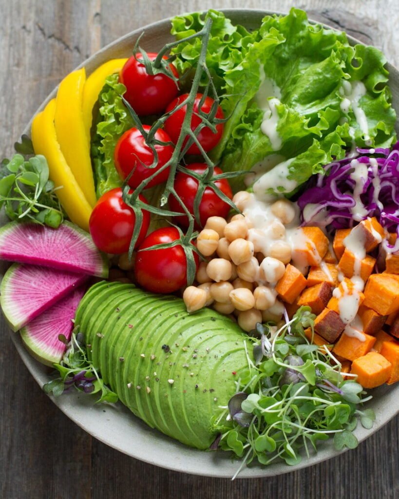 A colourful vegetable and grain bowl representing a blood-sugar-stable meal