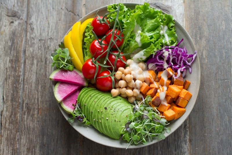 A colourful vegetable and grain bowl representing a blood-sugar-stable meal