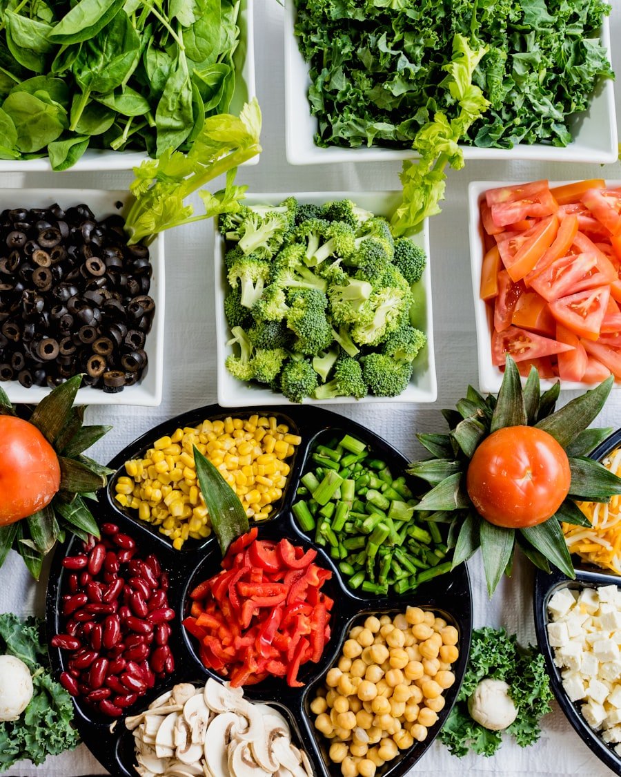 An arrangement of fresh vegetables, legumes and fibre-rich whole foods