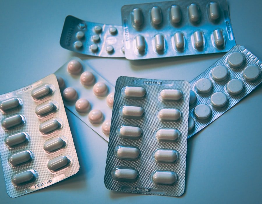 An organised flat lay of supplement capsules and powder on a linen surface