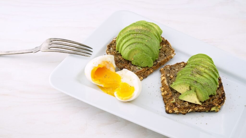 Sliced avocado on wholegrain toast