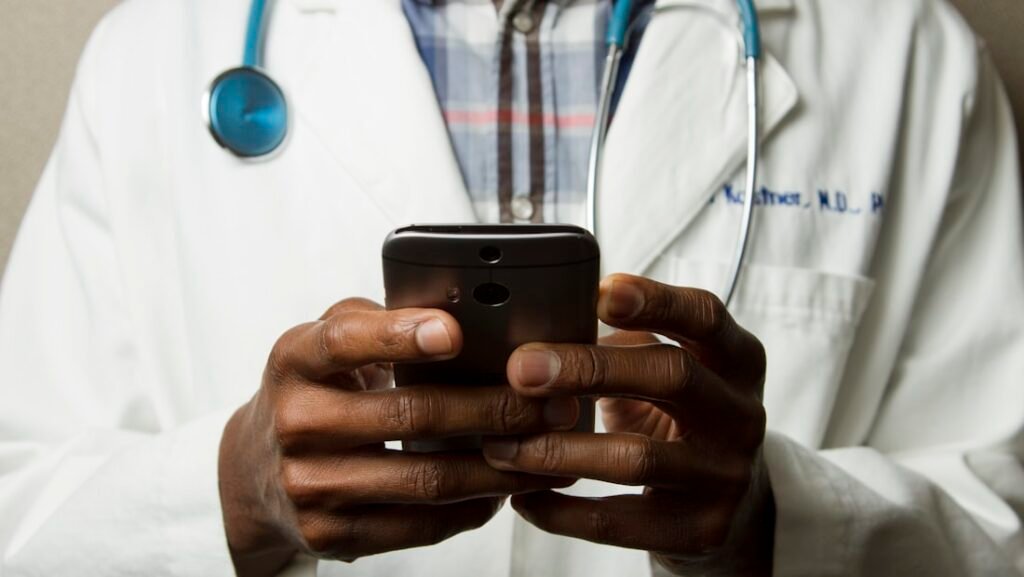 A clinician reviewing test results with a patient during an appointment