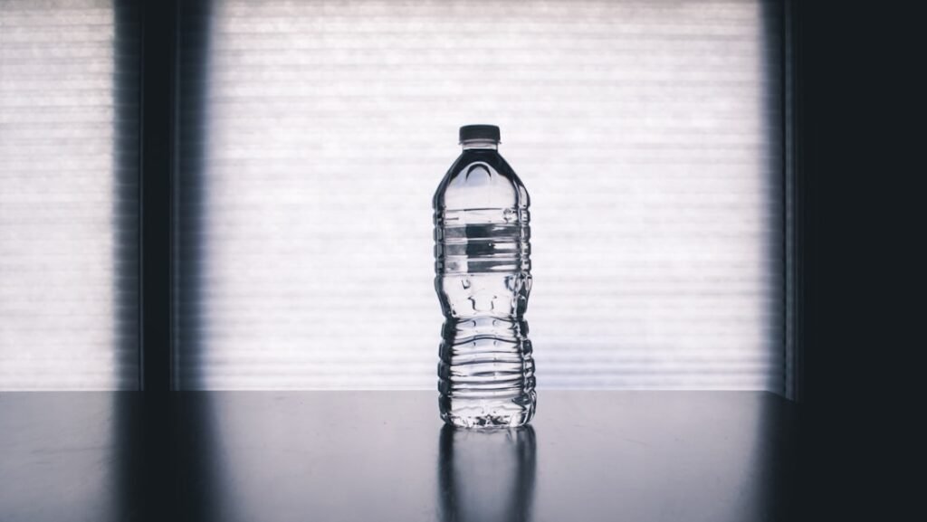 A glass of water on a pale surface